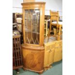 Mahogany veneered standing corner cupboard, the dentil pediment above an astragal glazed door and