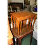 Nest of three mahogany occasional tables, mahogany mirror (4)