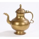 Persian brass coffee pot, with gadrooned cover above a bulbous body, on a stepped foot, 29cm high