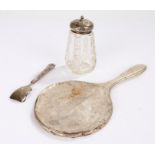 Silver hand mirror, silver preserve spoon, silver and clear glass sugar dredger, AF (3)