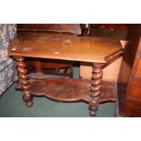 Edwardian mahogany occasional table, the table top with canted corners, raised on substantial