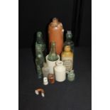 Collection of glass and pottery bottles, to include Wilmers aerated waters Newport Pagnell soda