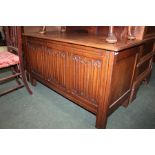 Oak coffer, with triple linen fold panelled front, on stile feet, 114cm wide