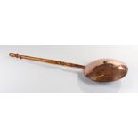 Large Victorian warming pan, the copper pan at 45cm in diameter, domed form, oak turned handle