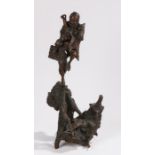 19th Century Oriental rootwood carving, depicting a figure standing on one leg, 57cm