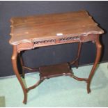 Edwardian style occasional table, the shaped top above a pierced frieze, on cabriole legs united