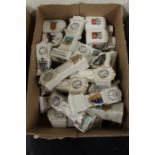 Collection of crested china, to include clocks and ambulances (qty)