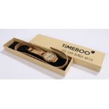 Timeboo bamboo wristwatch, the signed dial with baton markers, on a long cork bracelet, the case