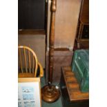 Oak standard lamp, with turned stem on a reeded base, 156cm high