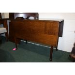 19th Century oak drop leaf table, on turned legs and pad feet, 102cm wide