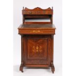 Victorian rosewood and boxwood inlaid davenport, the gallery top with swag inlay and mirror back