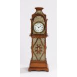 Victorian oak and brass miniature longcase clock, the arched pediment above a signed Howell &