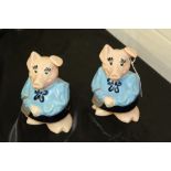 Pair of NatWest Wade pig money boxes (2)