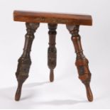 19th Century stool made from timber reclaimed from HMS Dolphin, the plank seat raised on three