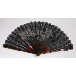 19th Century tortoiseshell fan, with a pictorial lace interior with shell base sticks, 35cm high