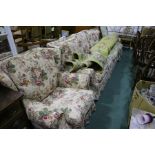 Floral upholstered three piece suite, consisting of three seater settee and two armchairs (3)