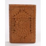 19th Century Indian carved sandalwood card case, carved with a chrysanthemum to both sides, 8.8cm