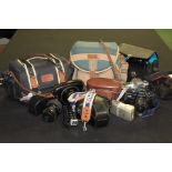 Cameras to include Praktica BX20, Olympus OM10, Canon EOS500, Canon Canonnet, two camera bags,