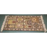 Prado Orient Keshan Super wool carpet, the cream ground ground scroll decoration and tasselled ends,