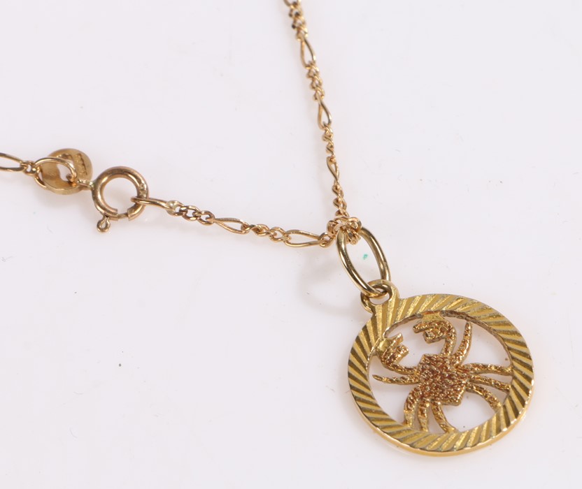 9 carat gold necklace with pierced Scorpio pendant, 2.2g