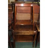 Edwardian mahogany occasional table, the oval top raised on square tapering legs united by a