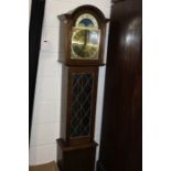 Fenclocks oak cased grandfather clock, the brass effect dial with Roman numerals, the lead glazed