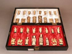 Schachspiel - China, 32 geschnitzte Elfenbeinfiguren, die Hälfte der Figuren leicht eingefärbt, in