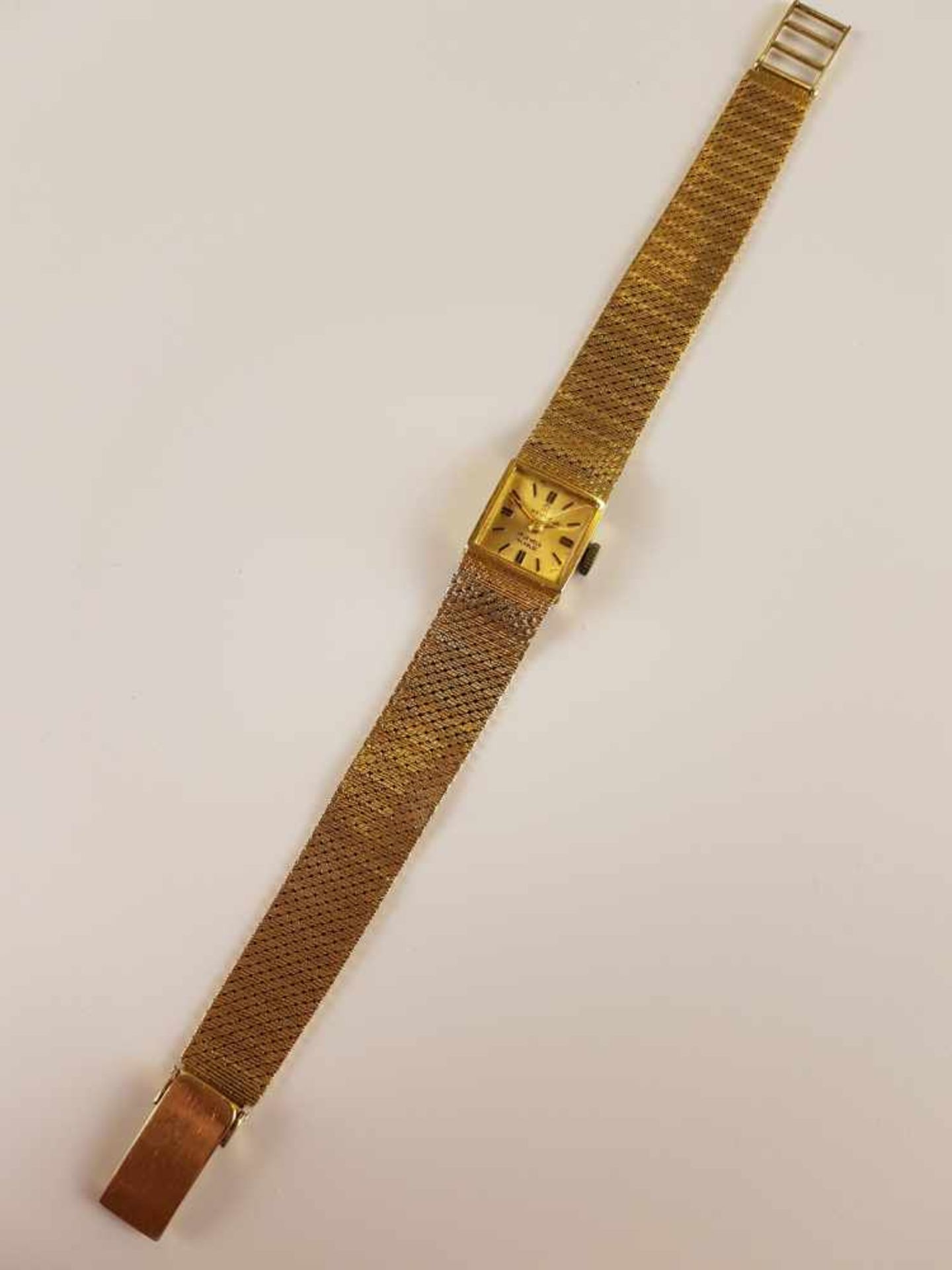 Damenarmbanduhr - Revue,Armband und Gehäuse aus 14K Gelbgold, gestempelt 585, quadratisches Gehäuse,