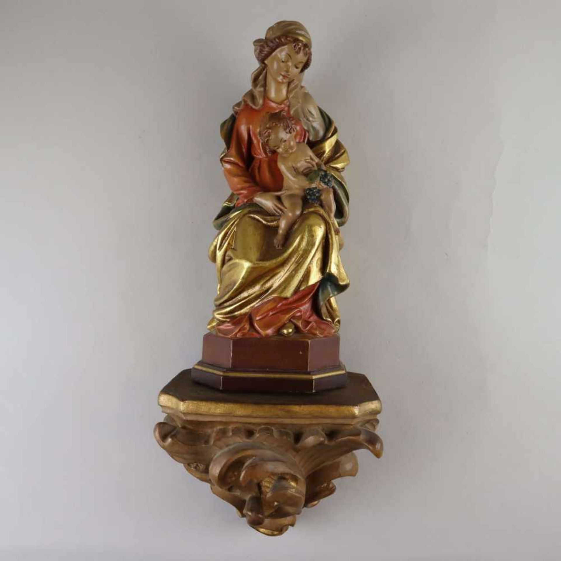 Thronende Madonna mit Kind - Südtirol 20. Jahrhundert, Holz, vollrund geschnitzt, polychrom und gold