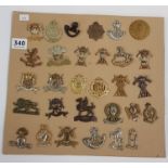 SHEET OF MILITARY BADGES ETC