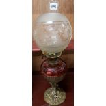 ANTIQUE OIL LAMP WITH CRANBERRY GLASS BOWL