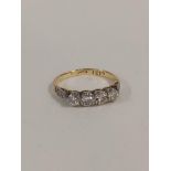 18 CARAT GOLD & PLATINUM 4 STONE DIAMOND RING