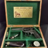 A CASED PERCUSSION DOUBLE ACTION 5 SHOT REVOLVER 1860 OF WEBLEY WEDGE TYPE WITH COLT STYLE UNDER