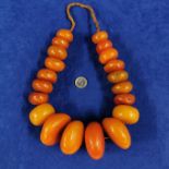 SET OF ANTIQUE RAW AMBER BEADS 738 grams