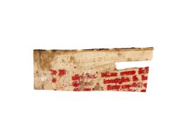 Small cutting of French verse, reused as a frisket in sixteenth century, manuscript on parchment