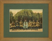 Reza Shah with Trustees and Artesh Officers, seated on a bench in Nakhshe Javan, hand-coloured print