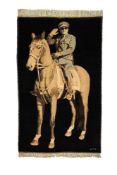 A fine pictoral silk carpet depicting Mohammad Reza Shah Pahlavi on horseback