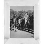 Empress Farah Diba and Crown Prince Reza ride on the grounds of the Palace at Saadabad