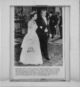 Royal Guests, Britain's Queen Elizabeth II is escorted by the Shah of Iran