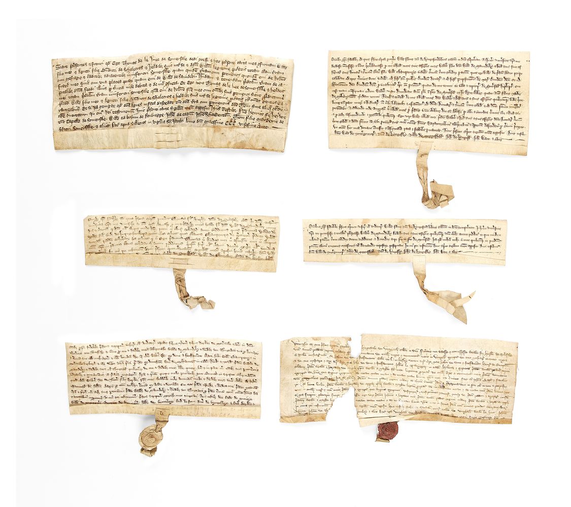 Collection of medieval charters, all in Latin, manuscript documents on parchment