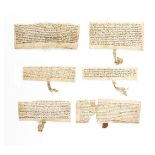 Collection of medieval charters, all in Latin, manuscript documents on parchment