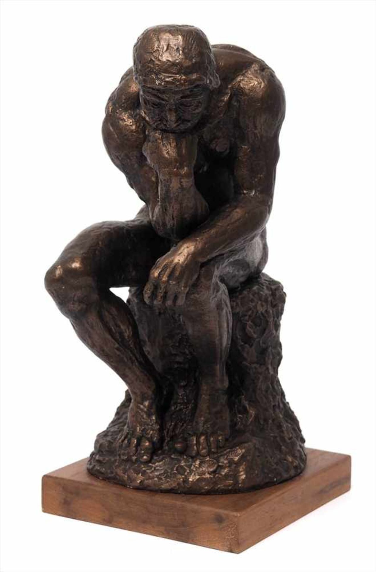 Museumsreplik"Der Denker" nach Rodin. Gips, bronziert, auf Holzsockel. H.40cm.