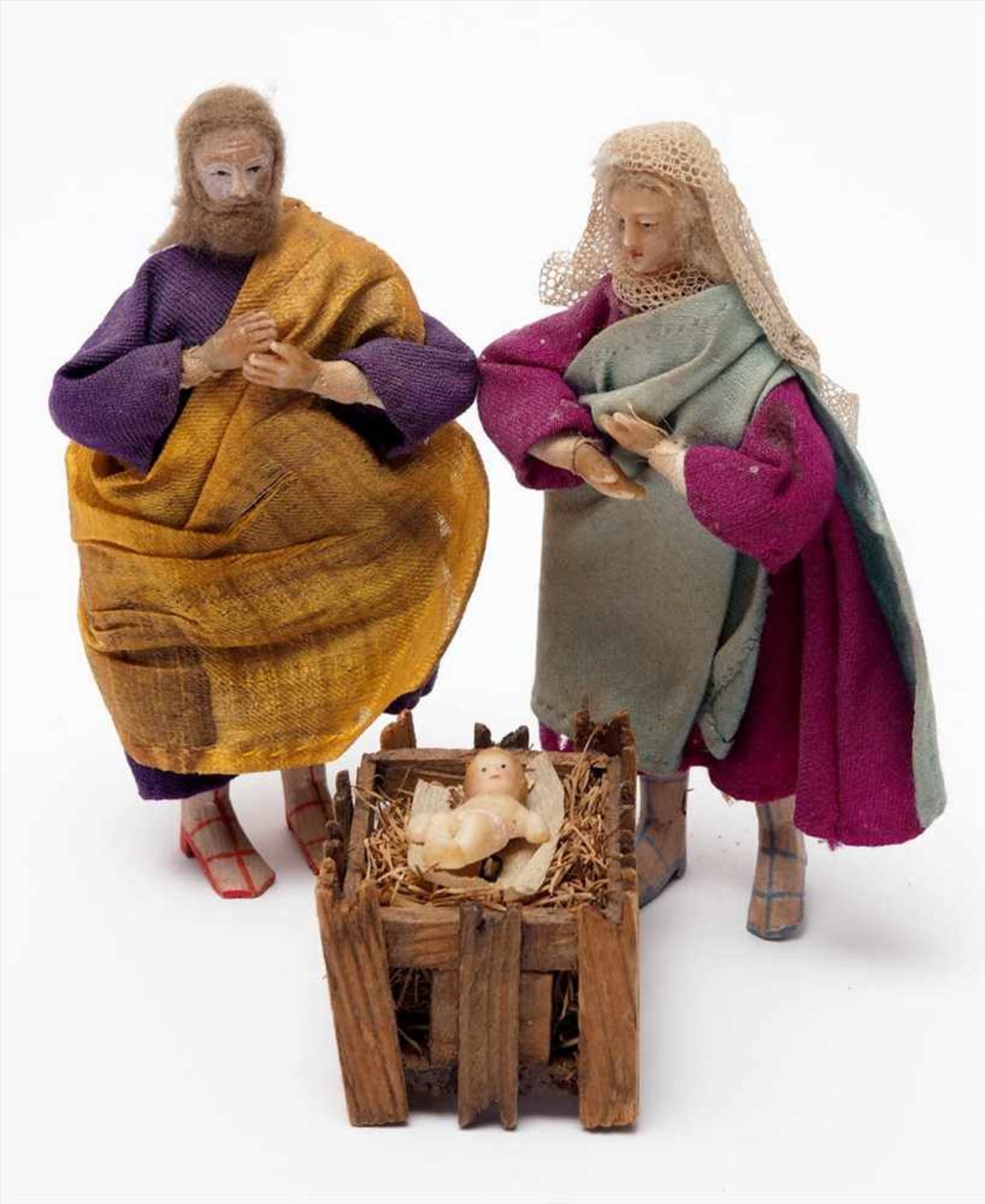 Drei Krippenfiguren, 19.Jhdt.Maria, Josef und Jesuskind. Körper aus Holz, Hände und Köpfe aus Wachs,
