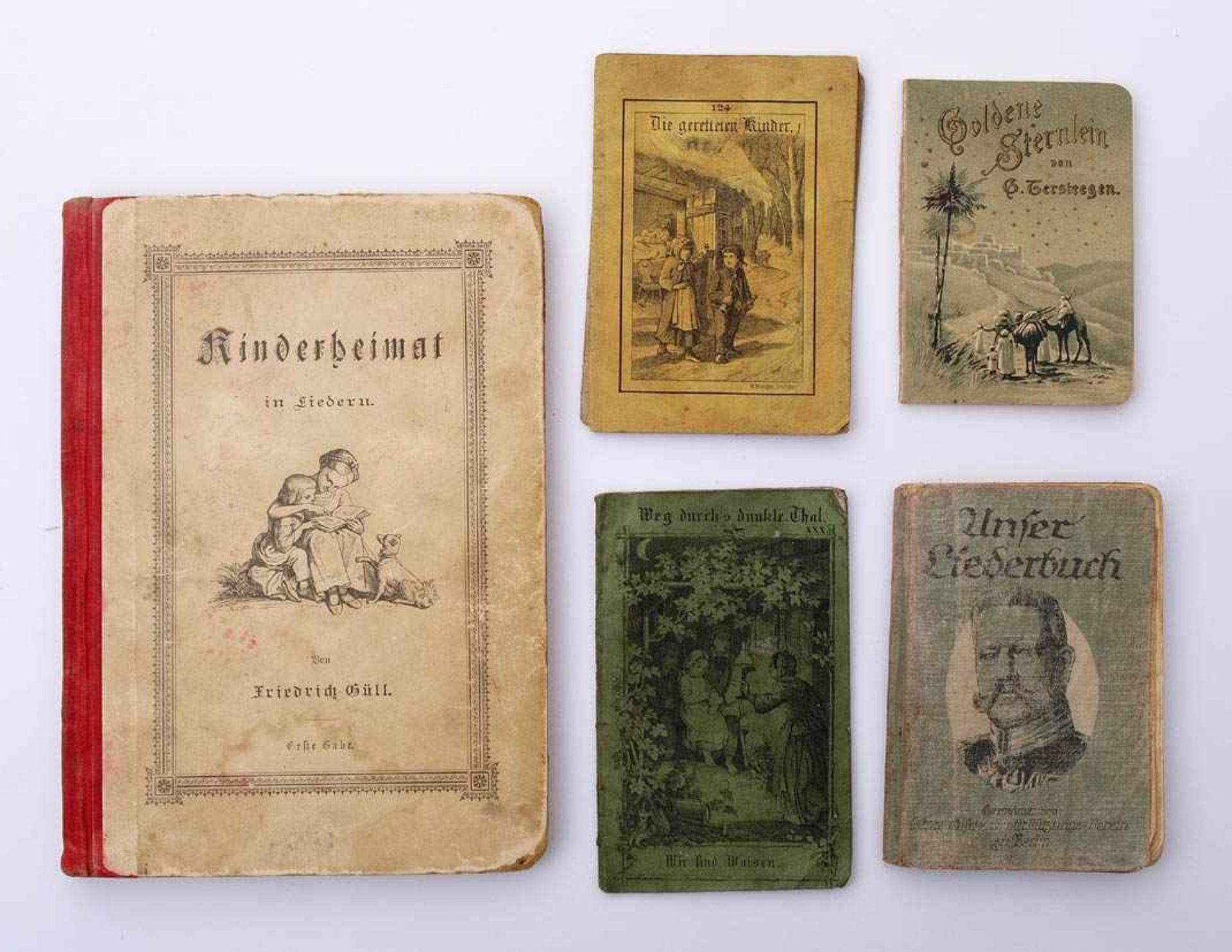 Konvolut Kinderbücher"Kinderheimat" aus dem Jahr 1889; Liederbuch, um 1900; dazu vier kleine