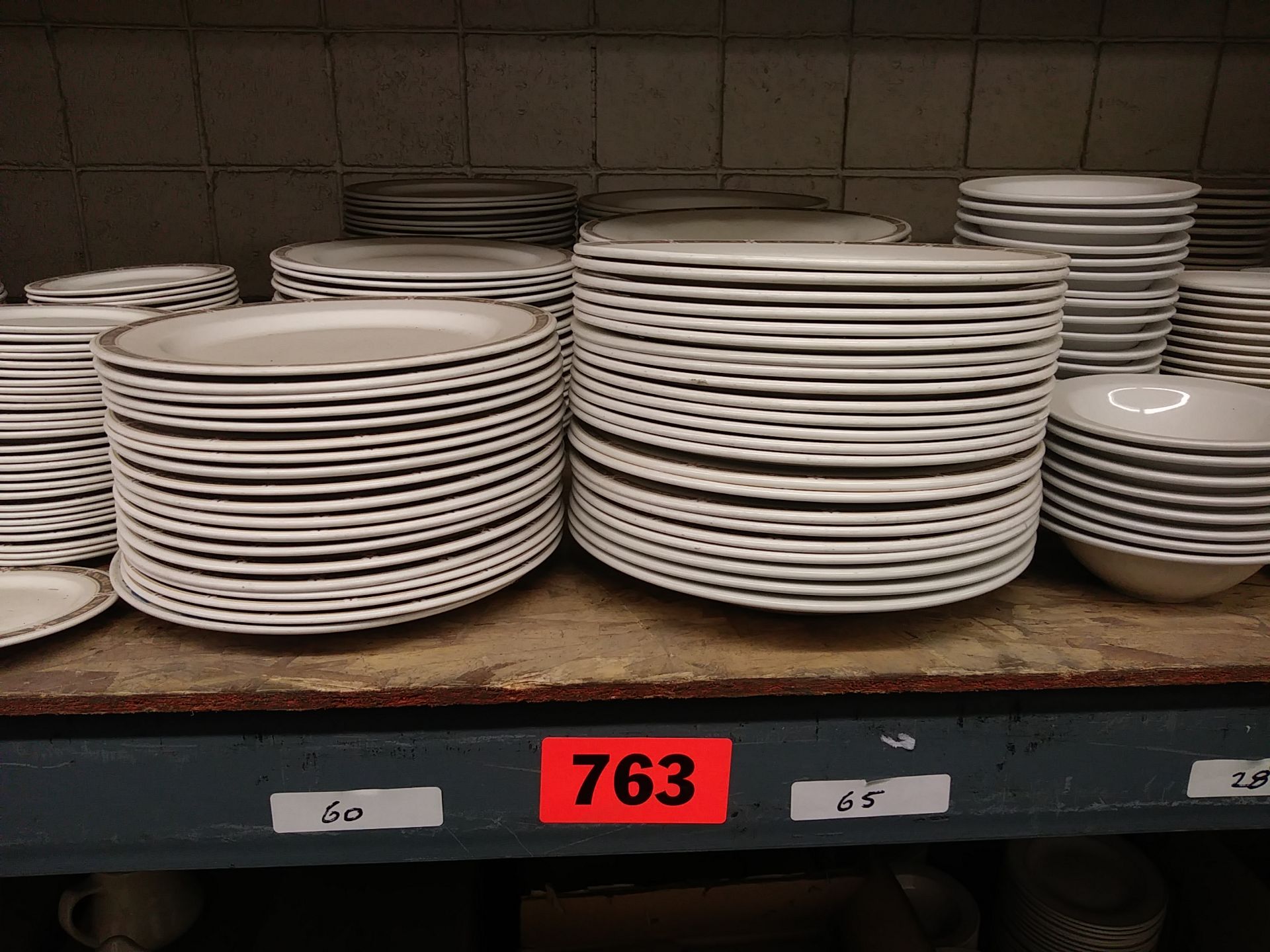 CONTENTS OF ENTIRE SHELF - (MISC DISHES ) INCLUDES: OVER 300 PLATES, BOWLS & SAUCERS - SEE QTY