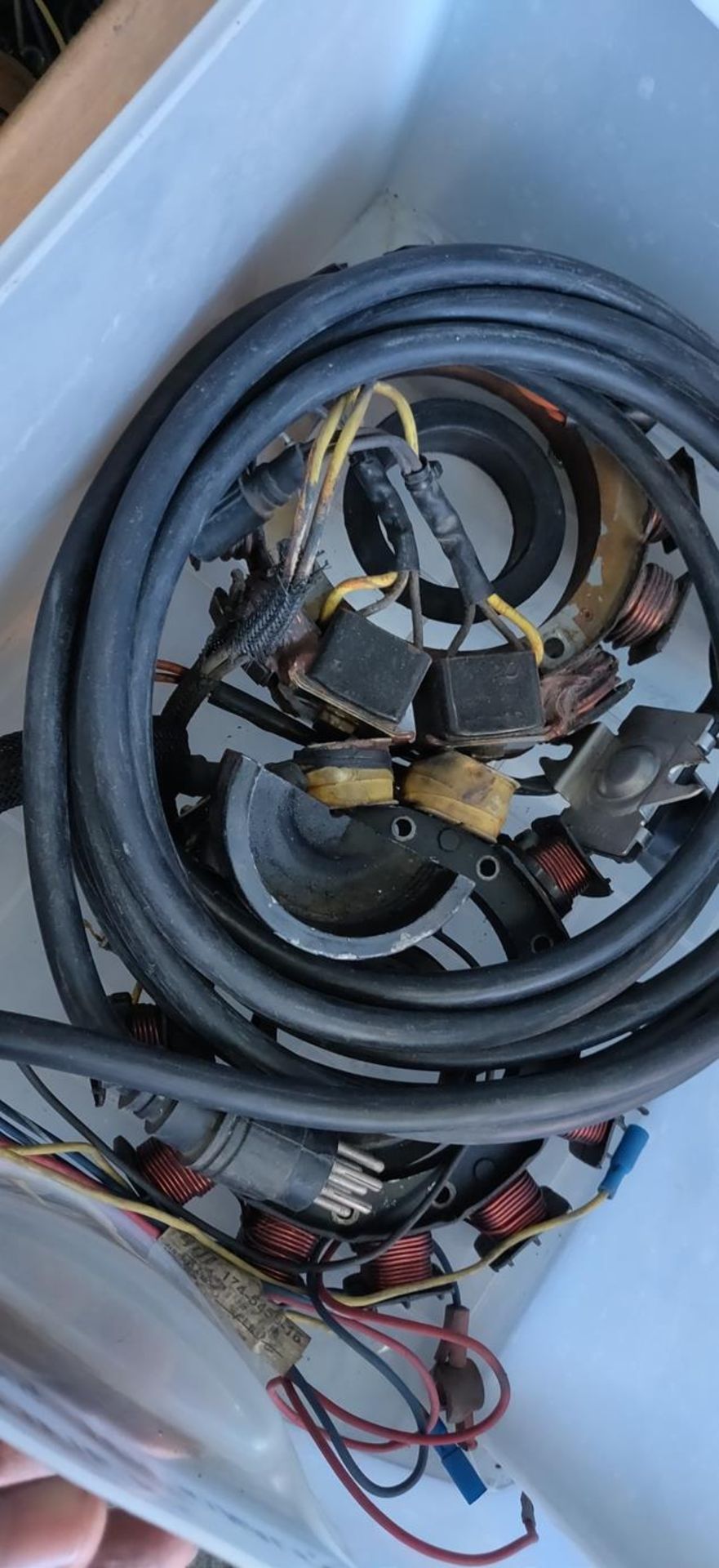 MISC MERCHANDISE UNDER TABLE - STEERING CABLES, FLY WHEEL MAGNETS, RUBBER MATS, TRANSFORMER, ETC - Image 6 of 9