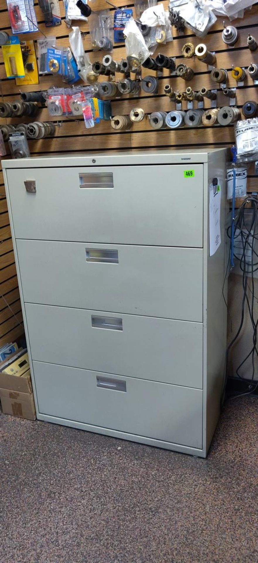 BEIGE 4 DRAWER CABINET 4 FT TALL - COMES WITH SOME MISC OFFICE SUPPLIES - Image 2 of 5
