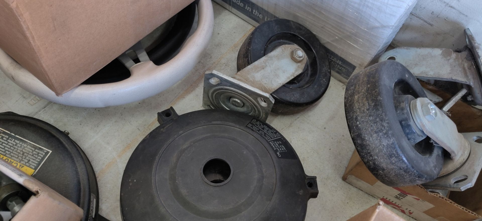 MISC MERCHANDISE UNDER TABLE - STEERING CABLES, FLY WHEEL MAGNETS, RUBBER MATS, TRANSFORMER, ETC - Image 8 of 9