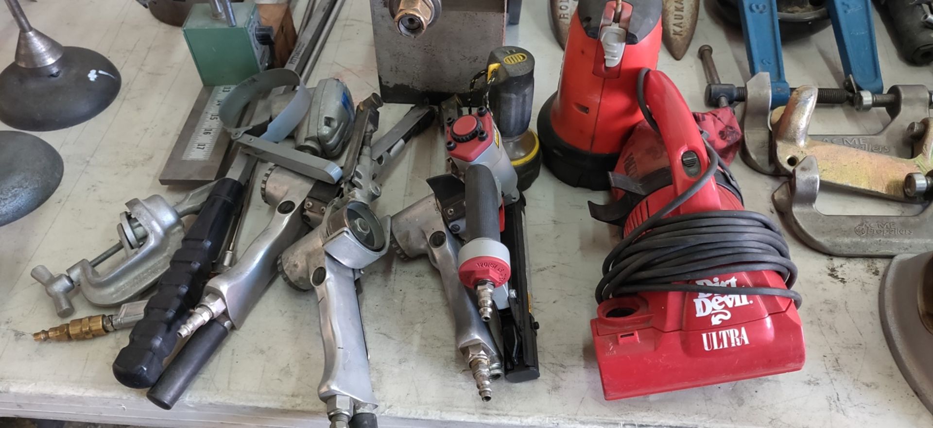 ASSORTED TOOLS: HAND BELT SANDER, STAPLER GUN, 2 PORTABLE LIGHTS, DIRT DEVIL VACUUM, ETC