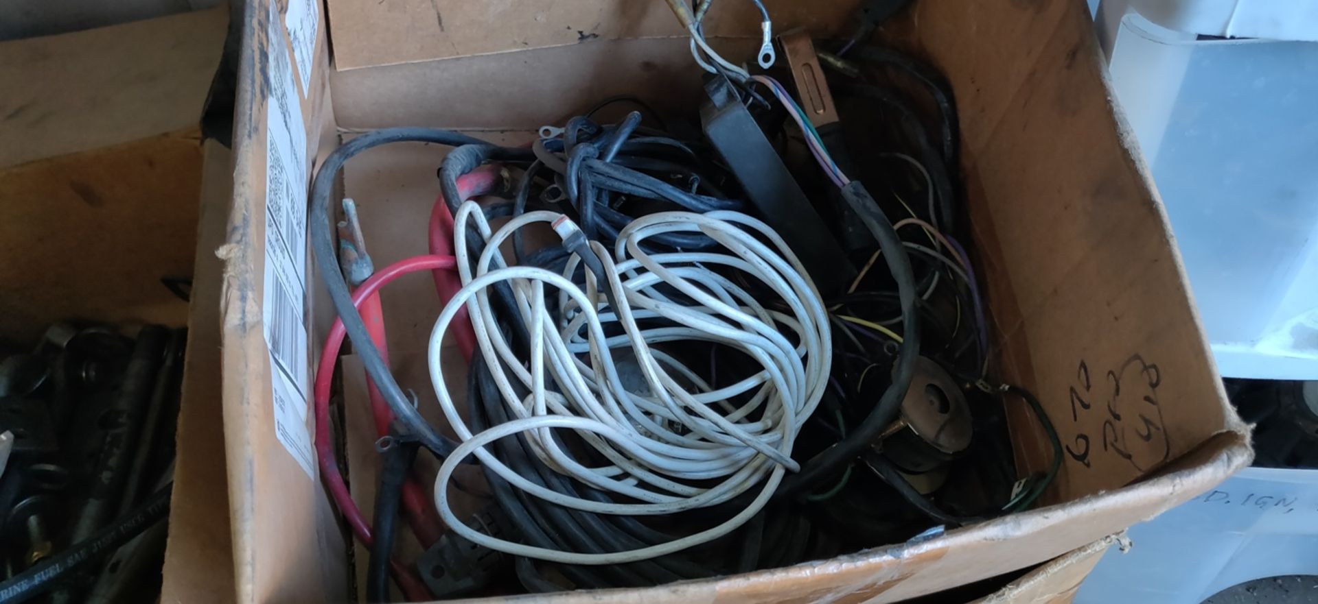 MISC MERCHANDISE UNDER TABLE - STEERING CABLES, FLY WHEEL MAGNETS, RUBBER MATS, TRANSFORMER, ETC - Image 4 of 9